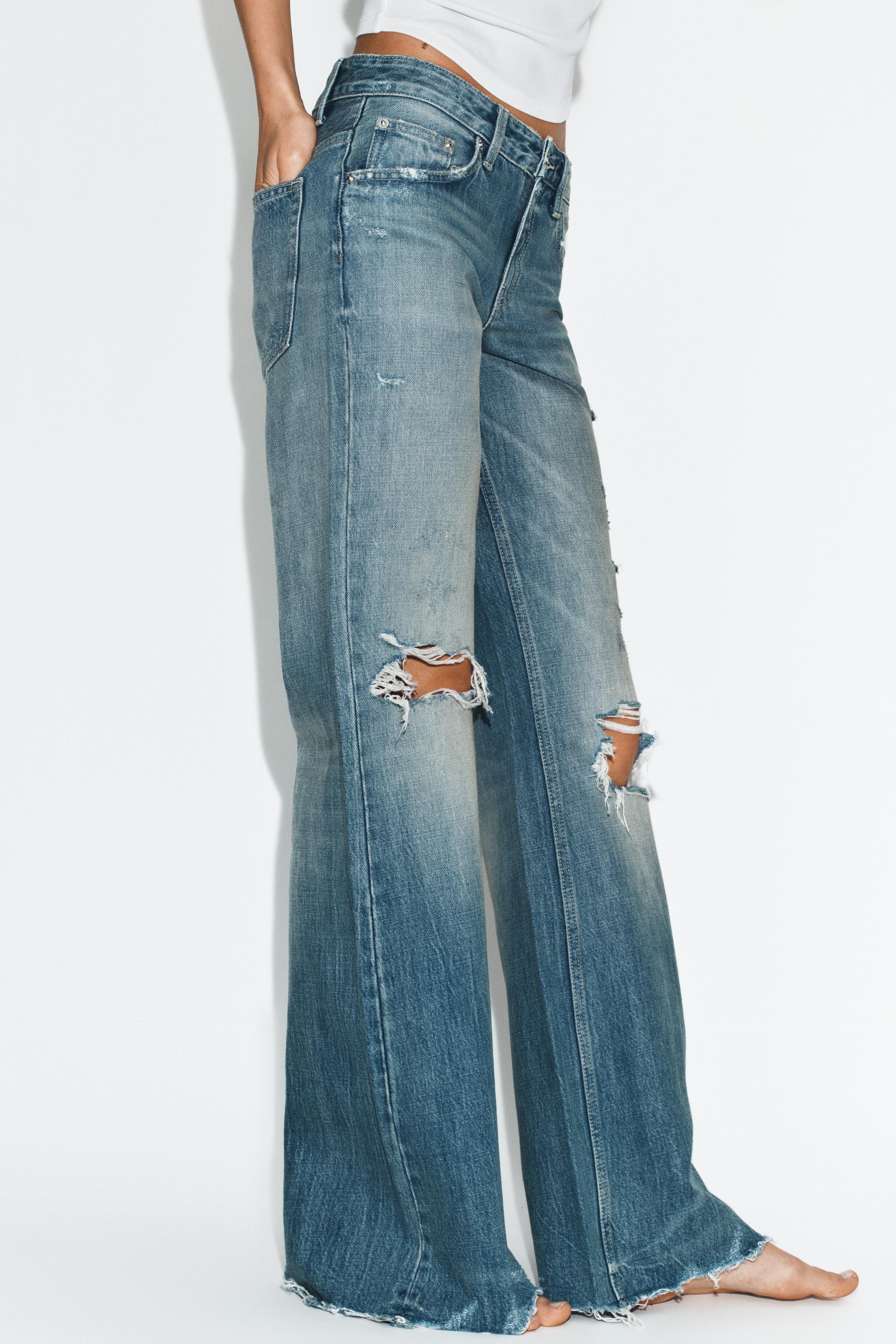 TRF FLARE RIPPED MID-RISE JEANS